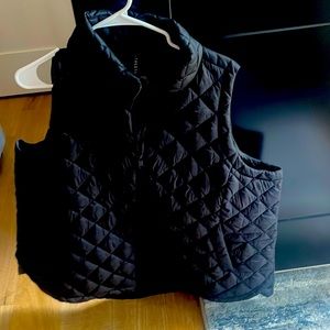 Athleta women’s black vest. Double zipper size 2x